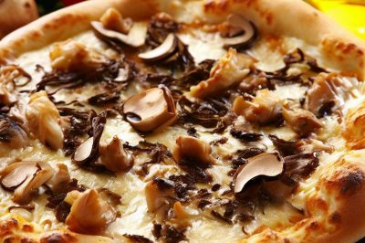 Delicious Mushroom and Truffle Oil Pizza