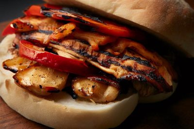 Grilled Chicken with Roasted Red Pepper and Caramelized Onion Ciabatta Sandwich